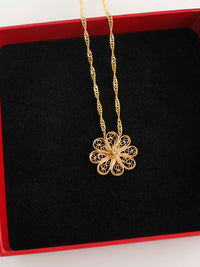 filigree flower medal (2060914753595)